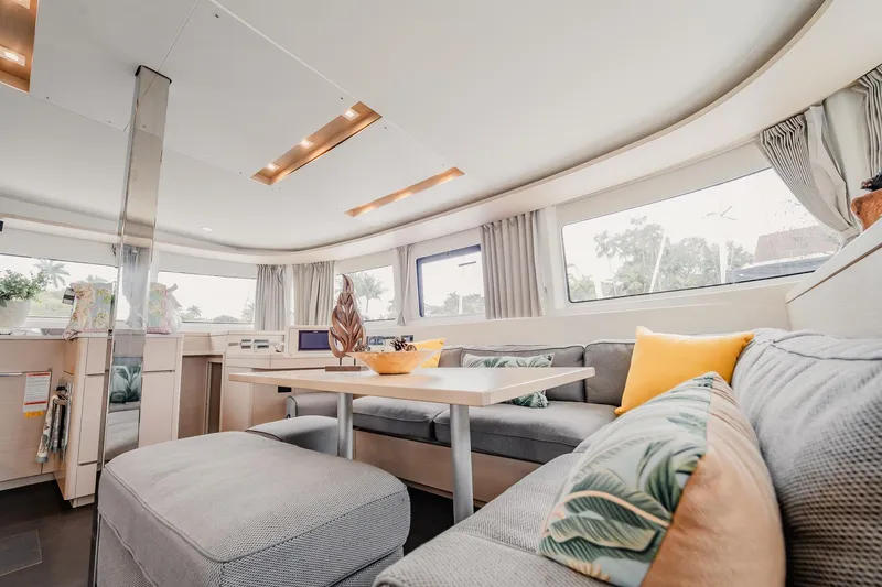 Slide: The Image of Luxurious interior of 2022 Lagoon 46 catamaran with modern seating and decor. - 54