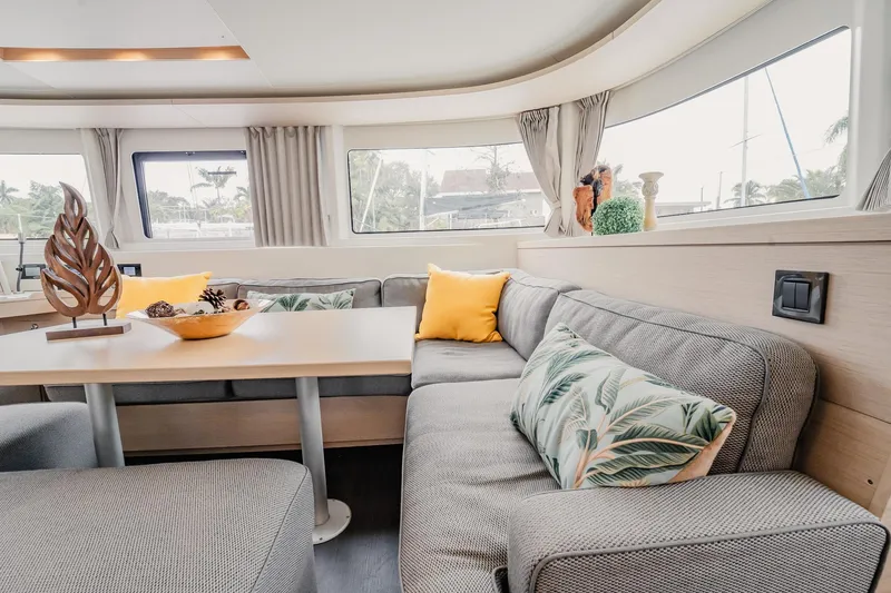 Slide: The Image of Luxurious interior of 2022 Lagoon 46 catamaran with stylish seating and decor. - 56