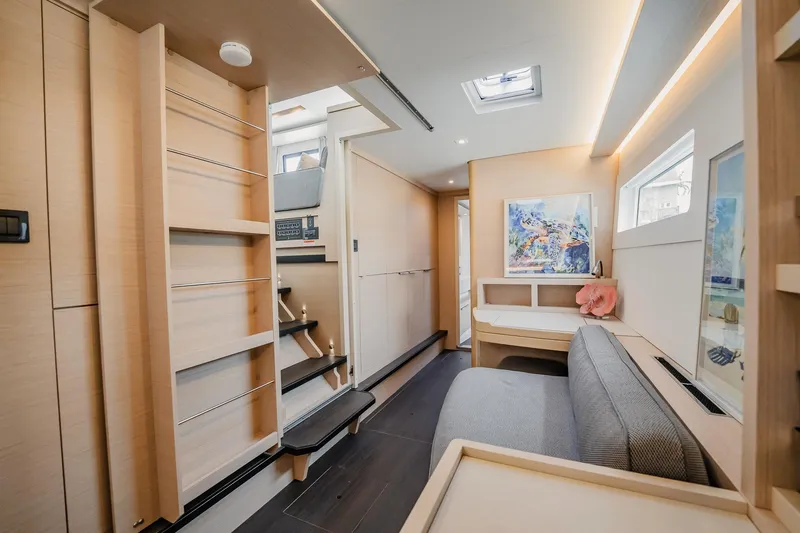 Slide: The Image of Luxurious interior of 2022 Lagoon 46 catamaran with modern design and natural lighting. - 65