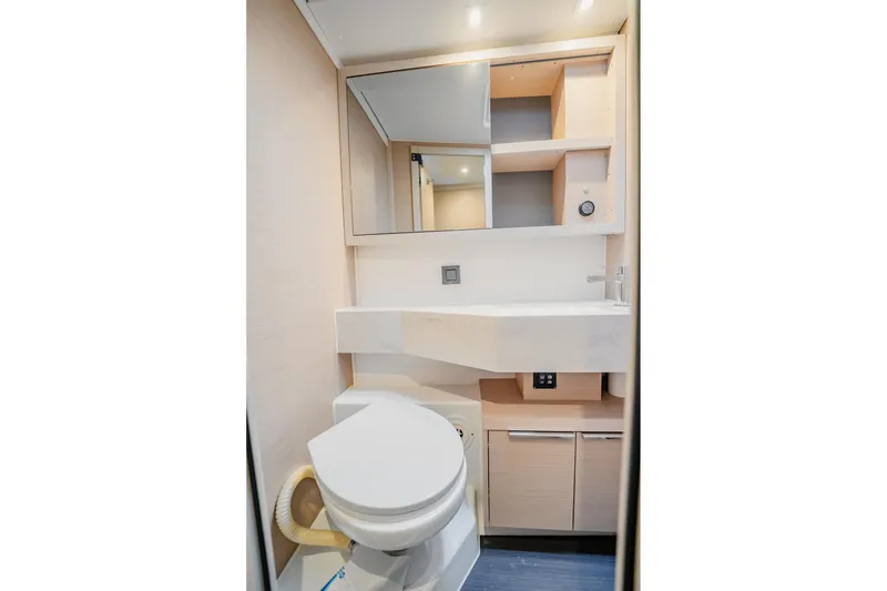 Slide: The Image of Modern bathroom in 2022 Lagoon 46 yacht with sleek fixtures and ample storage. - 72