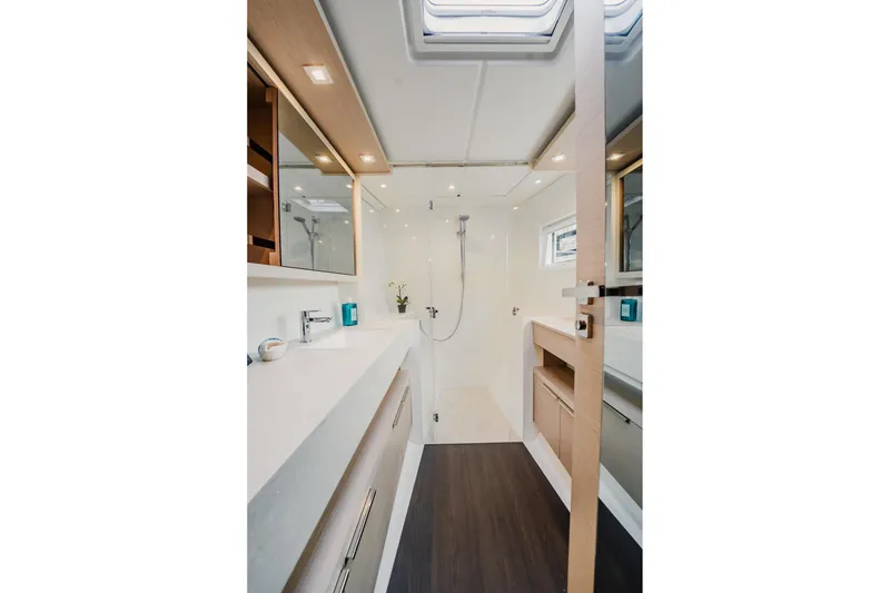 Slide: The Image of Luxurious bathroom interior of 2022 Lagoon 46 yacht with modern fixtures and elegant design. - 73