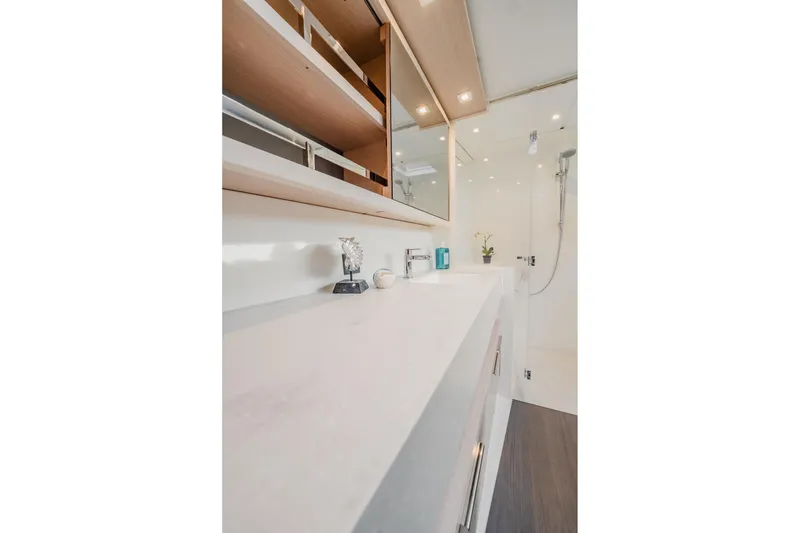 Slide: The Image of Modern bathroom interior on 2022 Lagoon 46 yacht, featuring sleek design and elegant fixtures. - 86