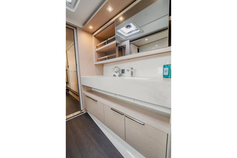 Slide: The Image of Modern bathroom interior of 2022 Lagoon 46 yacht with sleek design and ample storage. - 88
