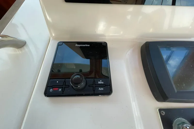 Slide: The Image of Raymarine control panel on 2008 Sabre 38 Salon Express yacht dashboard. - 37