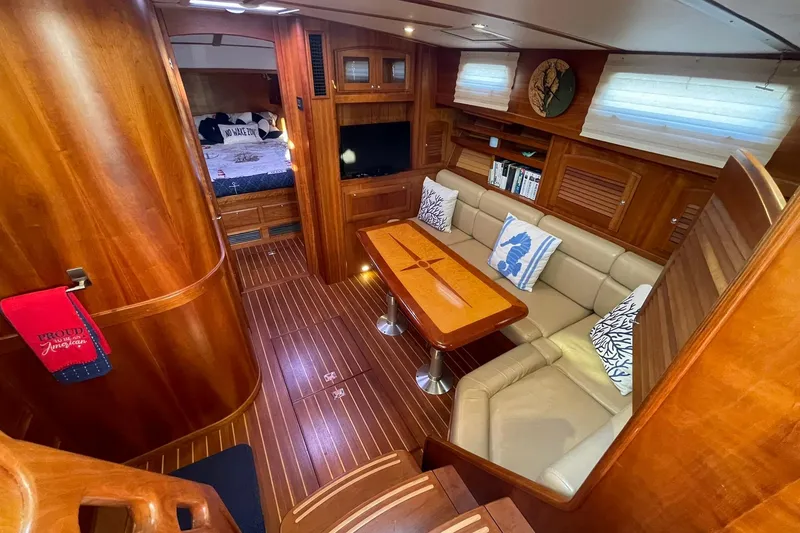 Slide: The Image of Luxurious interior of 2008 Sabre 38 Salon Express yacht with elegant wood finish and cozy seating. - 4