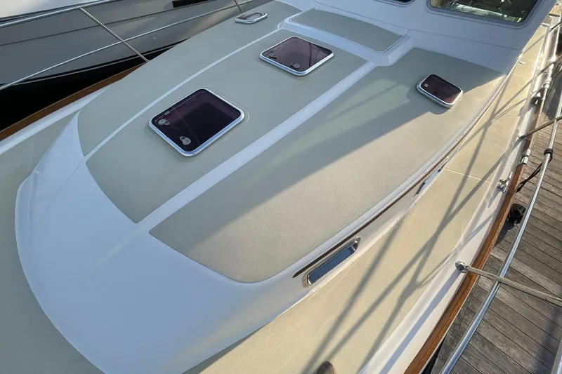 Slide: The Image of 2008 Sabre 38 Salon Express yacht deck with hatches and railing. - 59