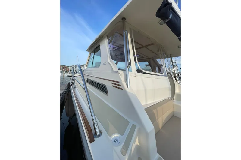 Slide: The Image of 2008 Sabre 38 Salon Express yacht, side view with sleek design and modern features. - 66