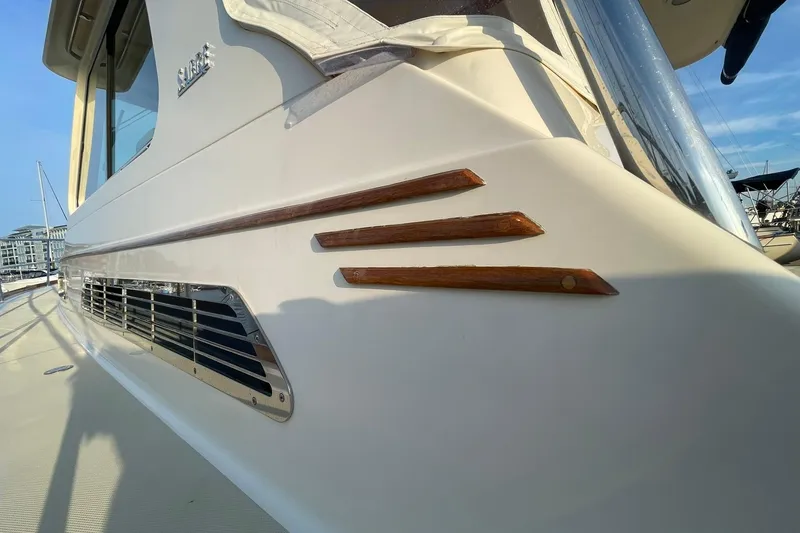 Slide: The Image of 2008 Sabre 38 Salon Express yacht detail with sleek design and wooden accents. - 68