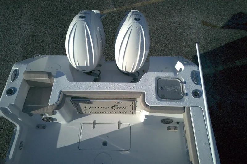 Slide: The Image of 2026 Sea Hunt Gamefish 27 boat with dual engines and forward seating. - 14