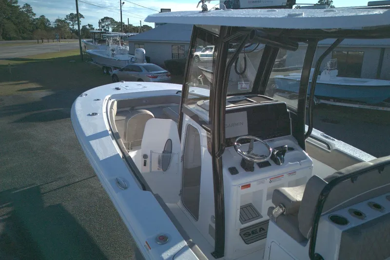 Slide: The Image of 2026 Sea Hunt Gamefish 27 Forward Seating boat with modern helm and seating. - 5