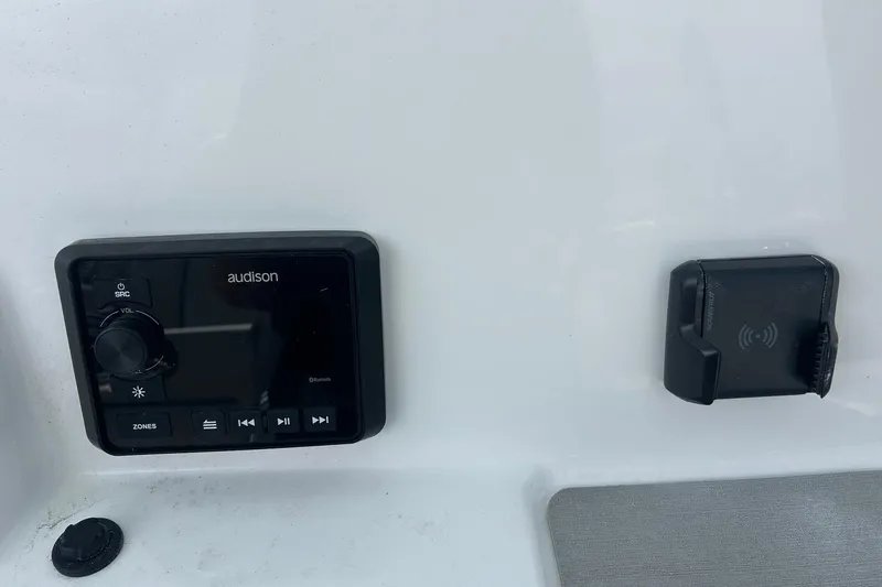 Slide: The Image of 2026 Sea Pro 222 Center Console audio control panel with Bluetooth connectivity. - 18
