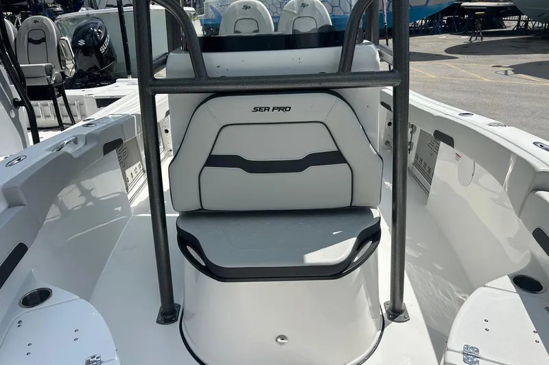 Slide: The Image of 2026 Sea Pro 222 Center Console boat interior with seating and console details. - 28