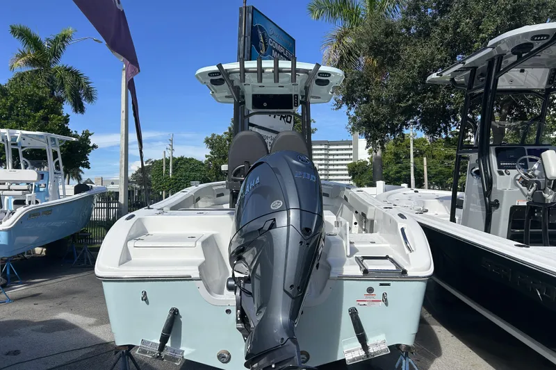 Slide: The Image of 2026 Sea Pro 222 Center Console boat with Yamaha outboard motor, displayed outdoors. - 3