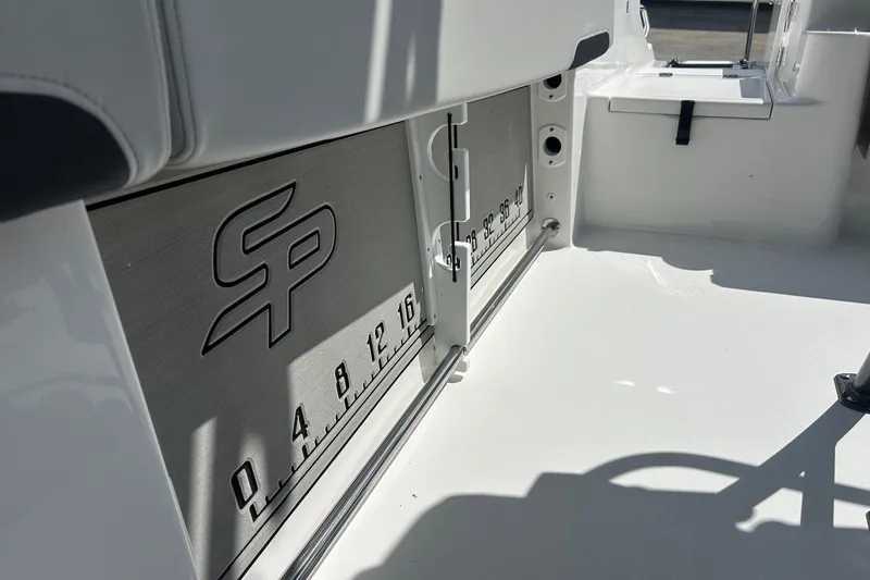 Slide: The Image of 2026 Sea Pro 222 Center Console interior with SP logo and measurement markings. - 34