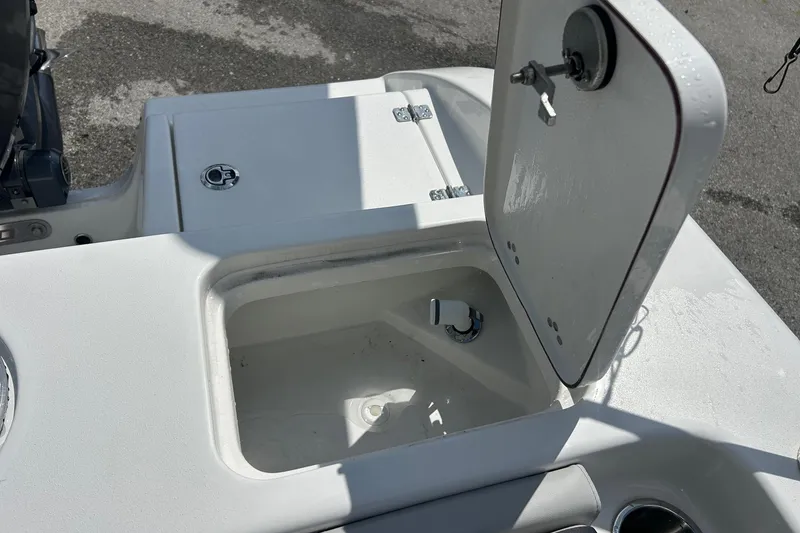 Slide: The Image of Open storage compartment on 2026 Sea Pro 222 Center Console boat. - 37