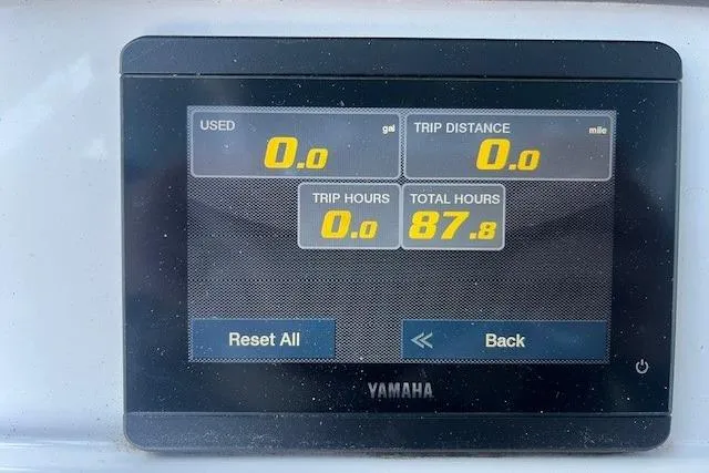 Slide: The Image of Yamaha display showing trip data on a 2023 Sea Hunt Ultra 234 boat. - 6