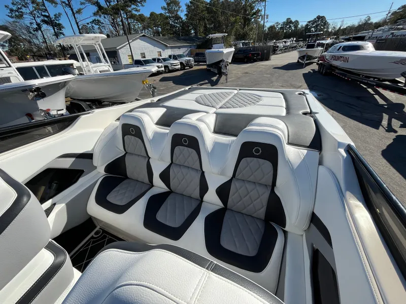 Slide: The Image of Interior of a 2007 Fountain 35 Lightning boat with white seating. - 13