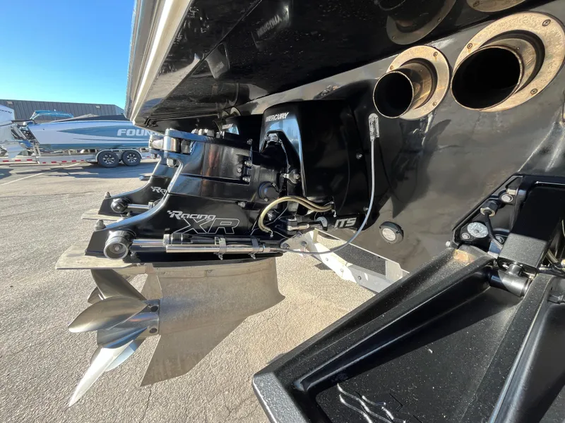 Slide: The Image of Rear view of a 2007 Fountain 35 Lightning boat with Mercury drive. - 5