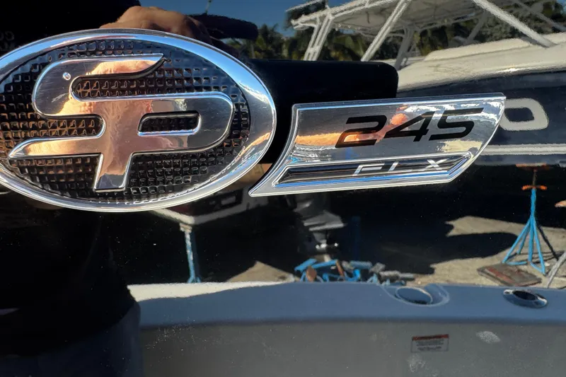 Slide: The Image of 2026 Sea Pro 245FLX Sandbar boat emblem with chrome detailing. - 39