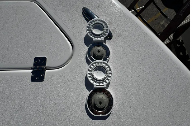 Slide: The Image of 2026 Sea Pro 245FLX Sandbar boat deck with hatch and fittings. - 46