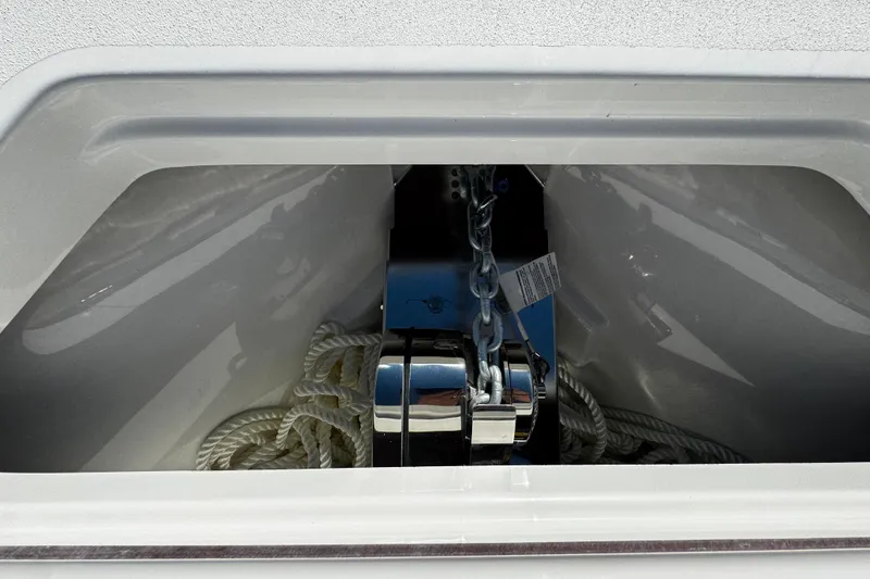 Slide: The Image of Anchor storage compartment on 2026 Sea Pro 245FLX Sandbar boat with rope and chain. - 47