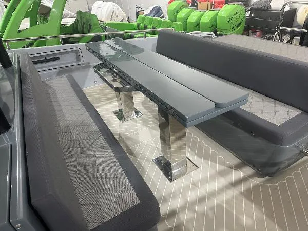 Slide: The Image of 2023 Canados 435 GLADIATOR boat interior with sleek seating and modern table design. - 7