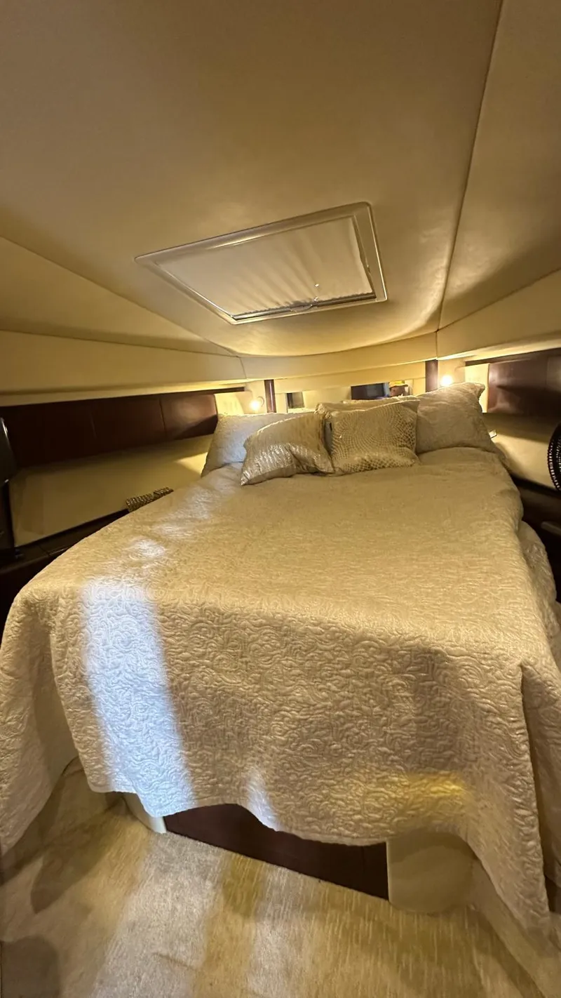 Slide: The Image of Luxurious bedroom interior of 2006 Sea Ray 44 Sedan Bridge yacht. - 19