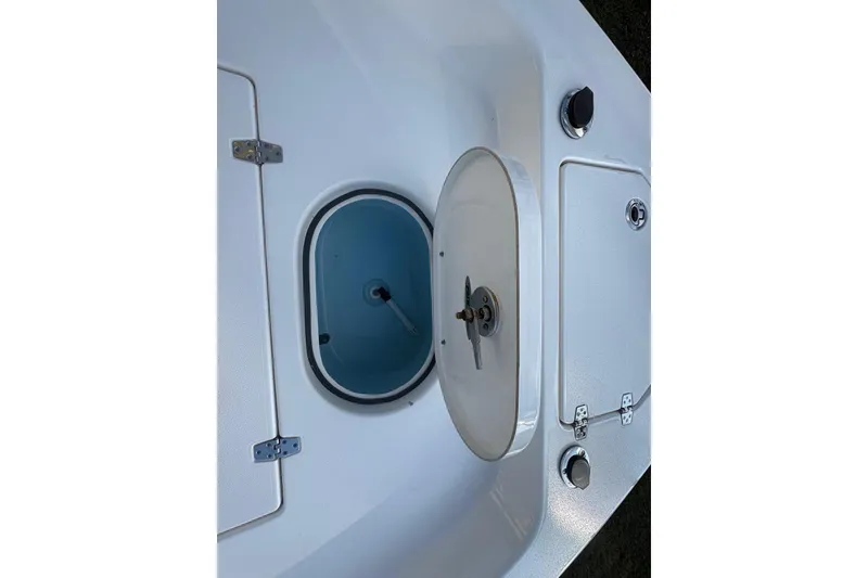 Slide: The Image of 2022 Pathfinder 2400 TRS boat interior with open storage compartments. - 11