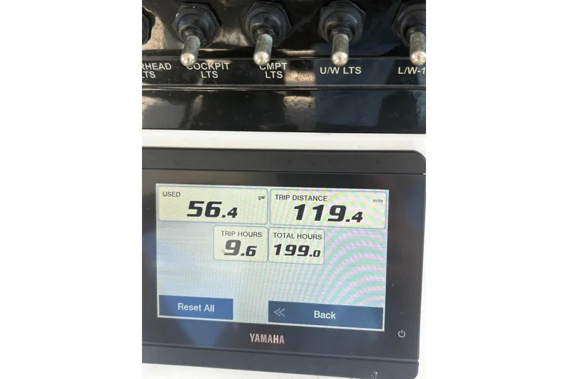 Slide: The Image of Yamaha display showing fuel usage and trip data on 2022 Pathfinder 2400 TRS boat. - 3