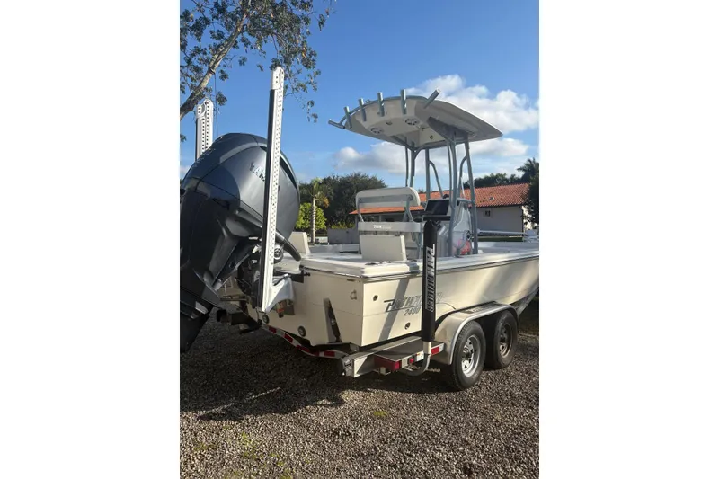 Slide: The Image of 2022 Pathfinder 2400 TRS boat on trailer, featuring Yamaha outboard motor. - 7