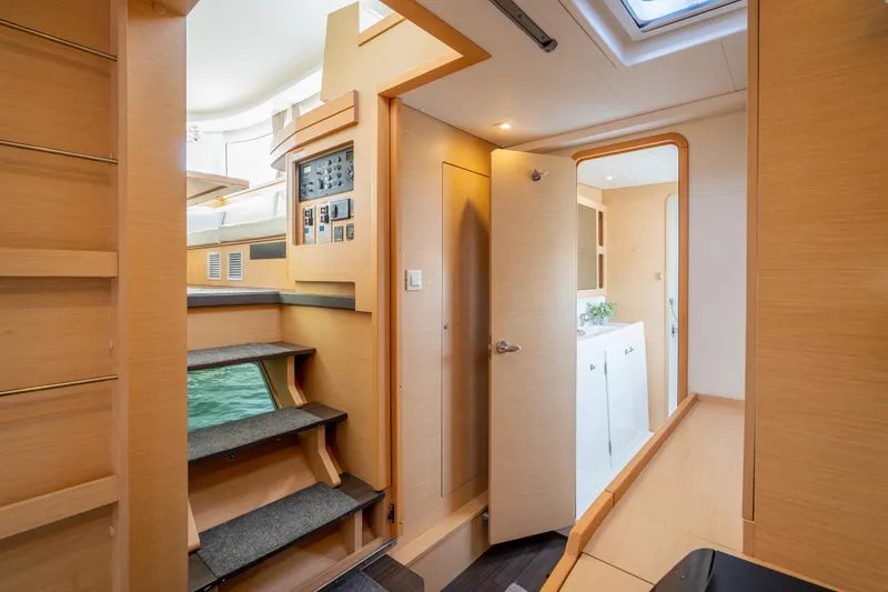 Slide: The Image of Interior of 2017 Lagoon 42 catamaran, featuring modern design and wooden finishes. - 39