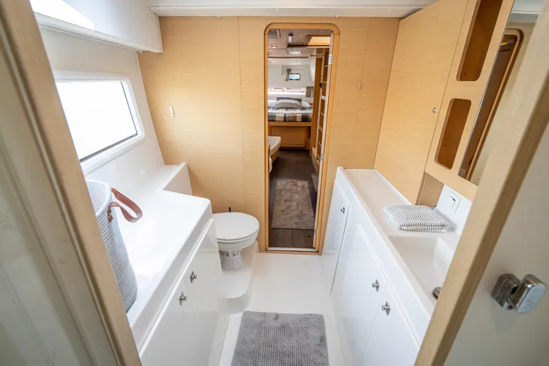 Slide: The Image of Luxurious bathroom interior of 2017 Lagoon 42 catamaran, featuring modern fixtures and ample natural light. - 42