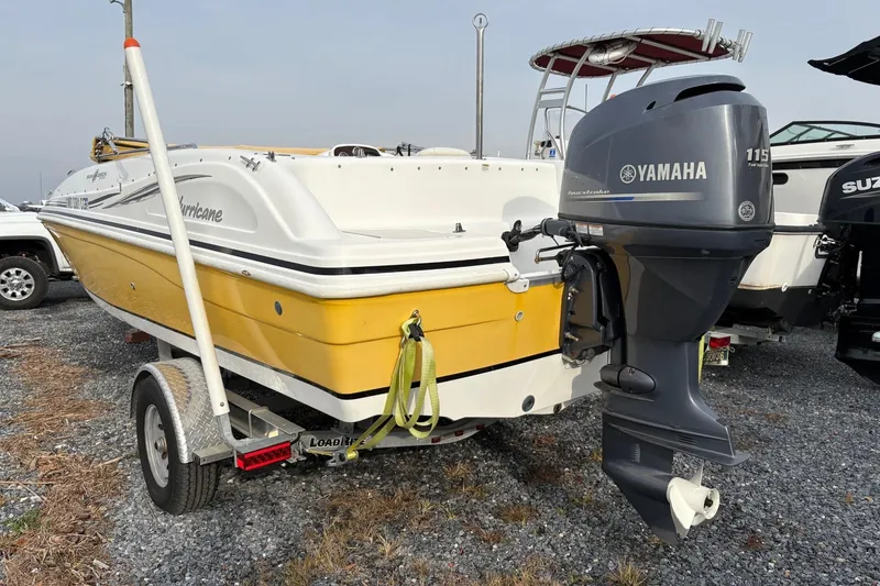 Slide: The Image of 2013 Hurricane SunDeck Sport 188 OB boat with Yamaha 115 outboard motor on trailer. - 4
