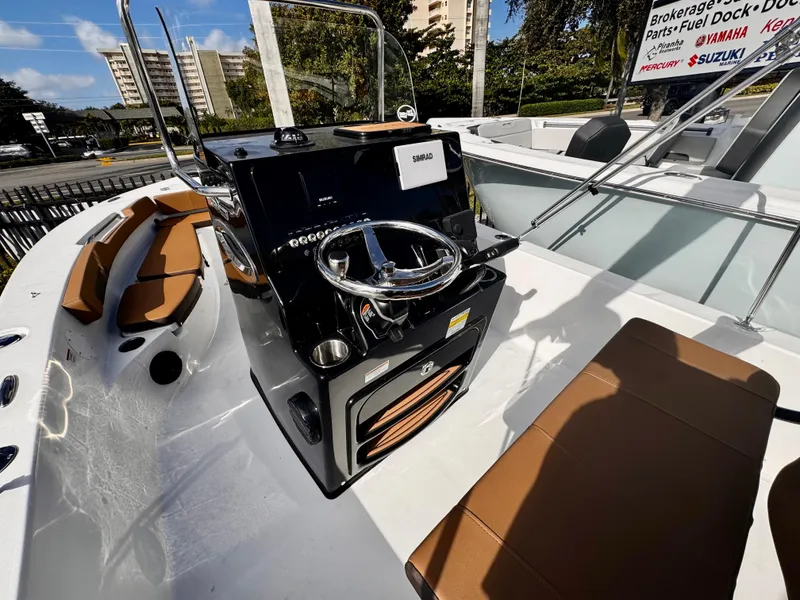 Slide: The Image of 2025 Sea Pro 202 Center Console boat with sleek design and modern steering console. - 10