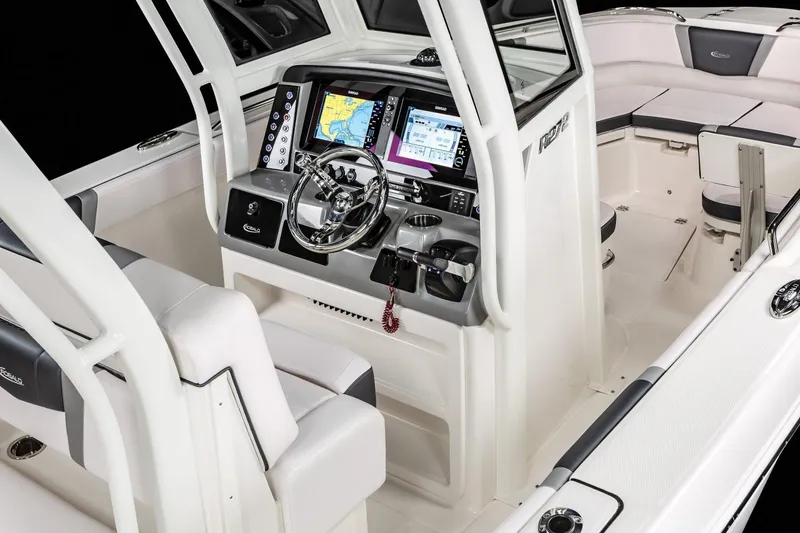 Slide: The Image of Manufacturer Provided Image: 2020 Robalo R272 Center Console boat interior with advanced navigation system. - 9