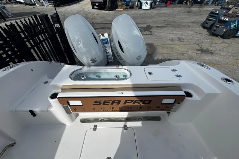 Slide: The Image of 2026 Sea Pro 262 Offshore boat with dual engines and spacious deck layout. - 10