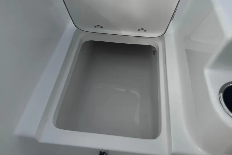Slide: The Image of Open storage compartment on 2026 Sea Pro 262 Offshore boat. - 6