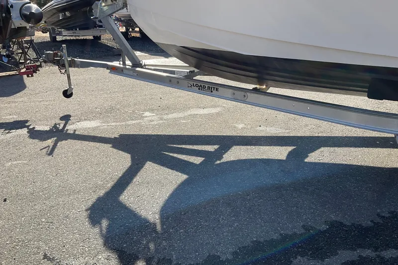 Slide: The Image of Boat trailer with Draco 22RS, 2017 model, on asphalt surface. - 21