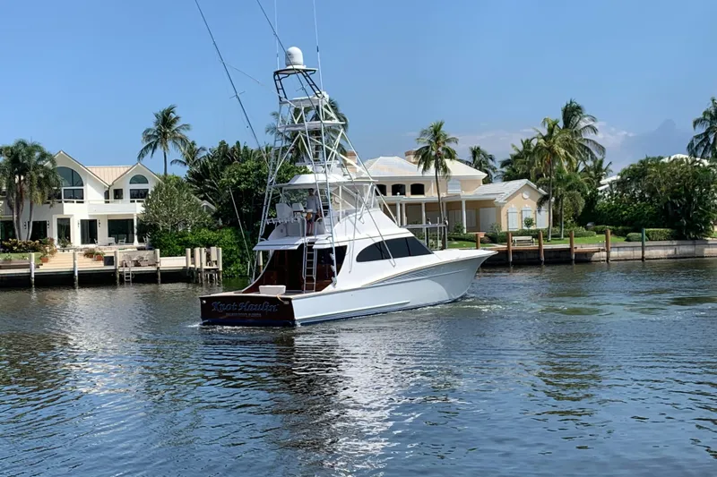 Slide: The Image of 2017 Spencer Convertible yacht cruising on open blue water under clear skies. - 1