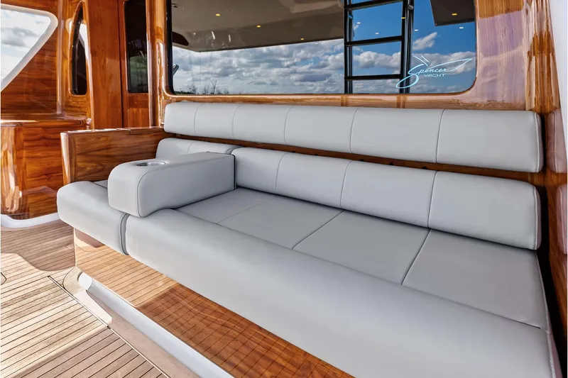 Slide: The Image of Luxurious seating on 2017 Spencer Convertible yacht with wooden accents and modern design. - 23