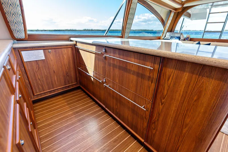 Slide: The Image of Luxurious wooden interior of a 2017 Spencer Convertible yacht with ocean view. - 39