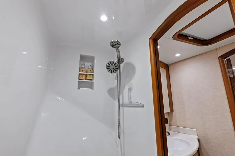 Slide: The Image of Luxurious 2017 Spencer Convertible shower with modern fixtures and built-in toiletry shelf. - 58