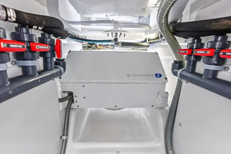 Slide: The Image of Engine room of 2017 Spencer Convertible with Seakeeper 9 stabilizer system. - 73