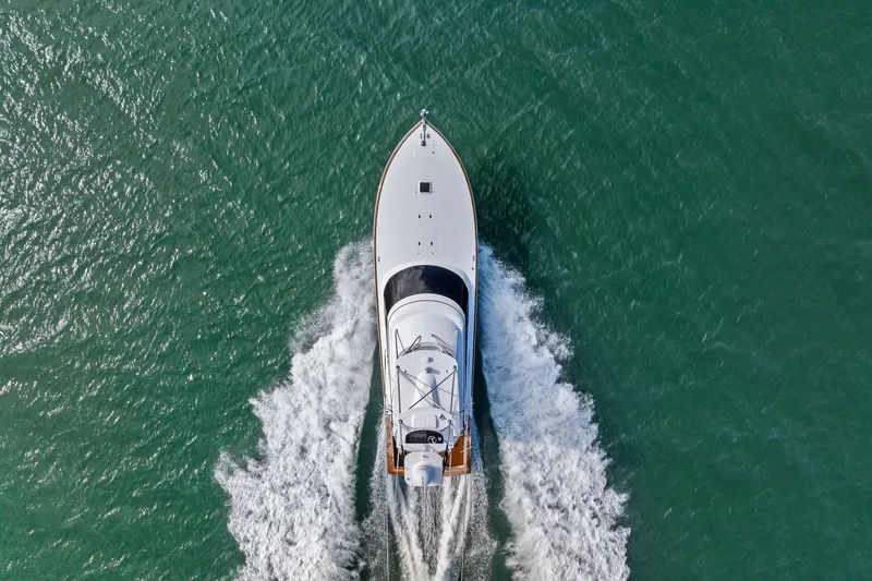 Slide: The Image of Aerial view of 2017 Spencer Convertible yacht cruising on open water. - 8