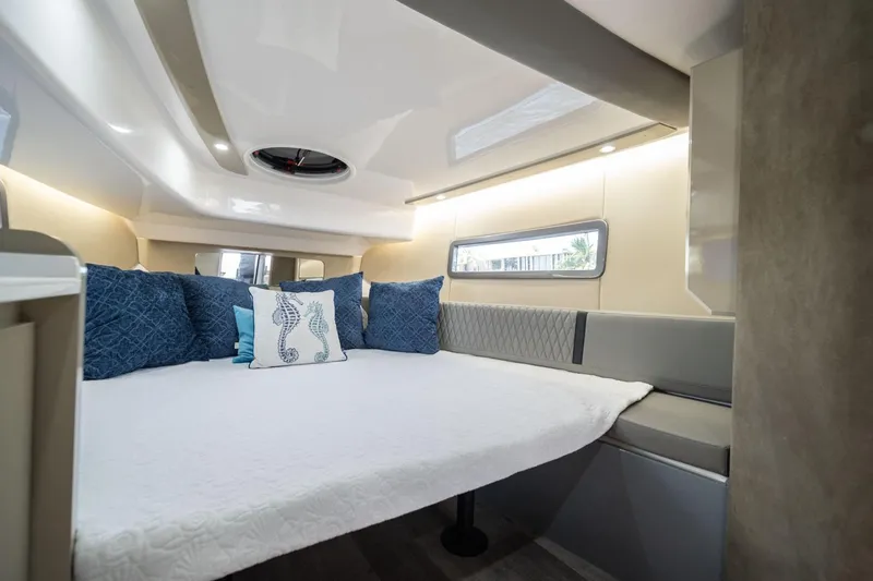 Slide: The Image of Luxurious interior of 2026 Hanover 387 with cozy bed and stylish cushions. - 22