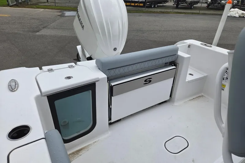 Slide: The Image of 2026 Sportsman Open 232 Center Console boat interior with seating and storage. - 12