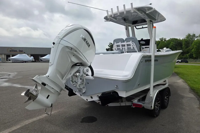 Slide: The Image of 2026 Sportsman Open 232 Center Console boat with Yamaha engine on trailer. - 4
