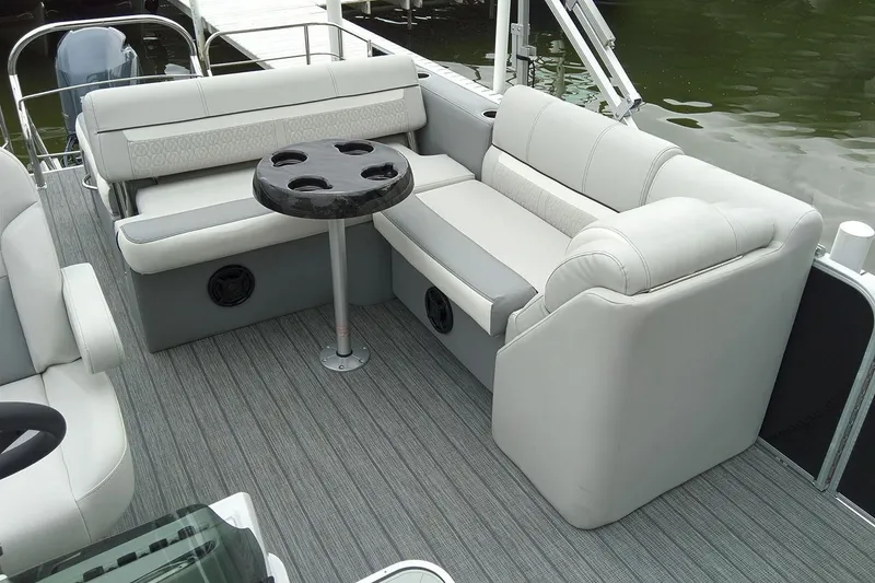 Slide: The Image of Manufacturer Provided Image: 2019 Sweetwater 2286 SFL pontoon boat interior with gray seating and round table. - 21