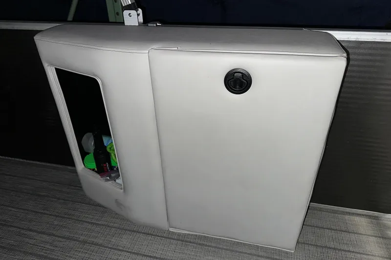 Slide: The Image of 2019 Sweetwater 2286 SFL boat storage compartment with visible items inside. - 9