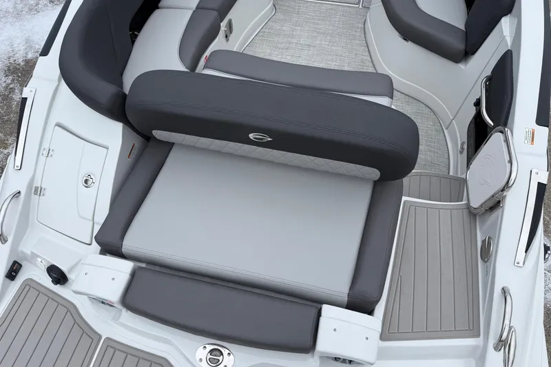 Slide: The Image of 2026 Crownline 288 SS boat interior with gray seating and sleek design. - 14